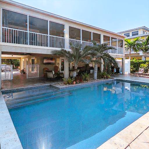 Exceptional VENETIAN SHORES home with pool, dock and boat lift. — photo 3