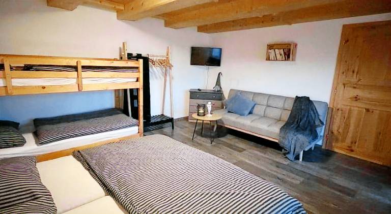 Holiday apartment with yard, patio & private pool in Benecko
