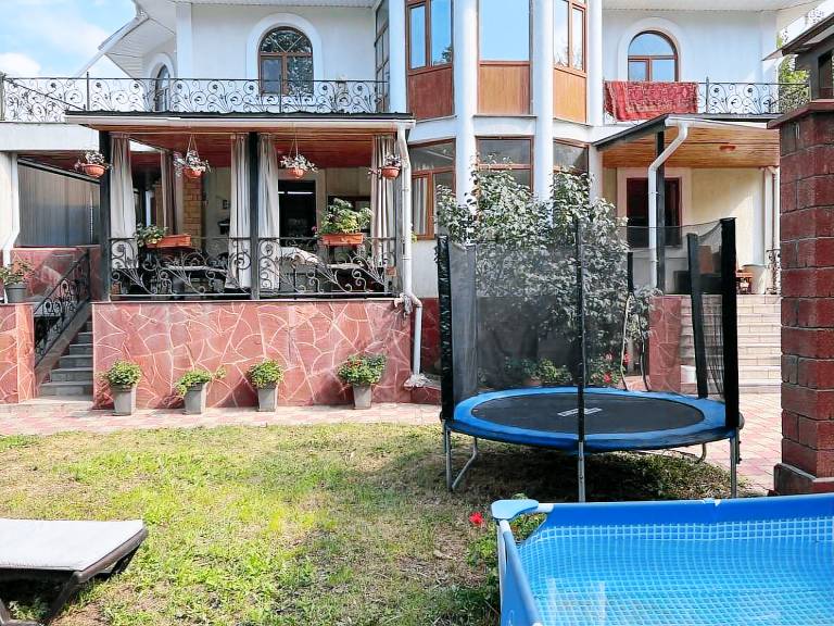 Vacation home with pool, garden & grill | Perfect for remote work in Almaty
