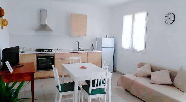 Holiday apartment with patio & yard in Loano