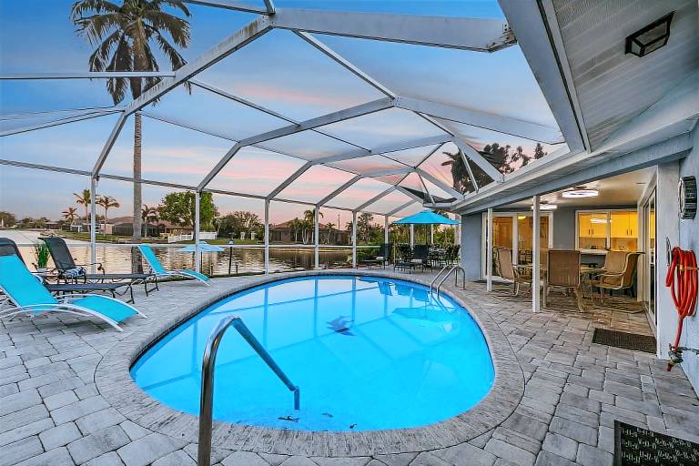 Family-friendly house with BBQ & private pool | Water view | Dogs allowed in Cape Coral, FL