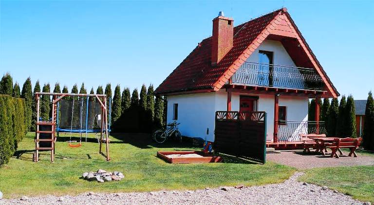 Lodge with barbeque, patio & yard in Koszalin