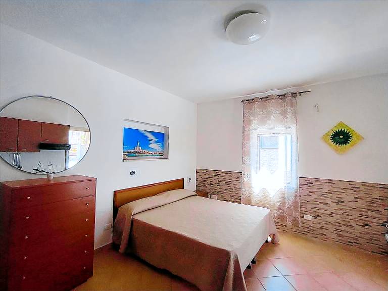 Holiday Home 'Villa Elvira Monolocale' with Private Terrace, Shared Garden and Air Conditioning — photo 4