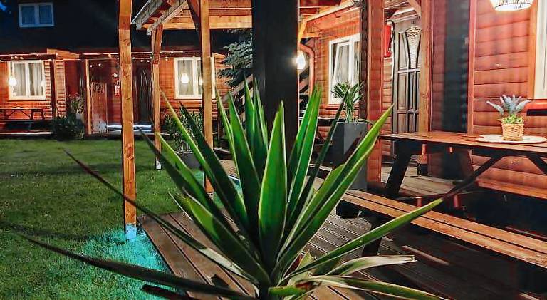 Serviced apartment with garden, patio & pool in Darlowo