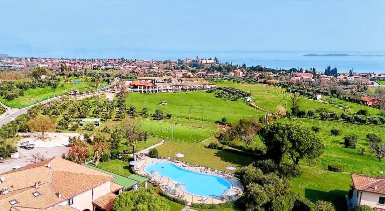 Serviced apartment with pool, yard & patio in Manerba del Garda