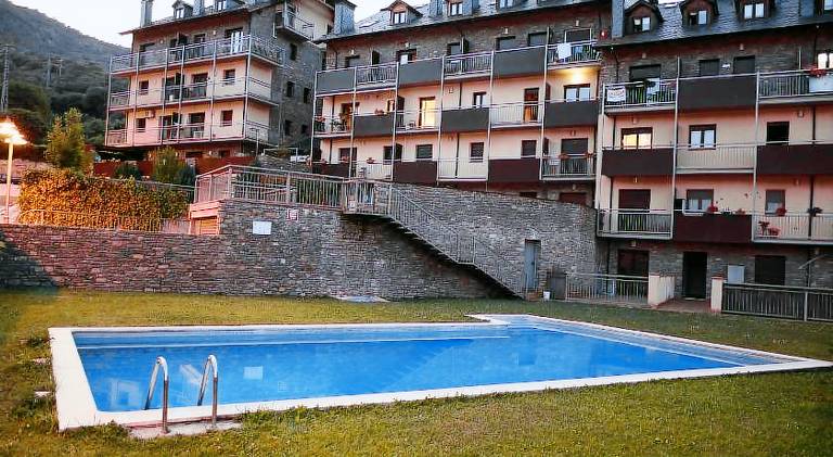 Apartment with patio, yard & private pool in Sort