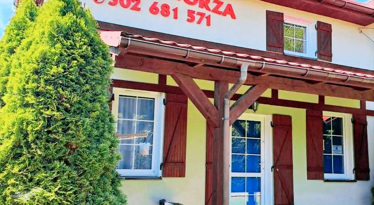 Lodge with terrace, barbecue & yard in Ustka