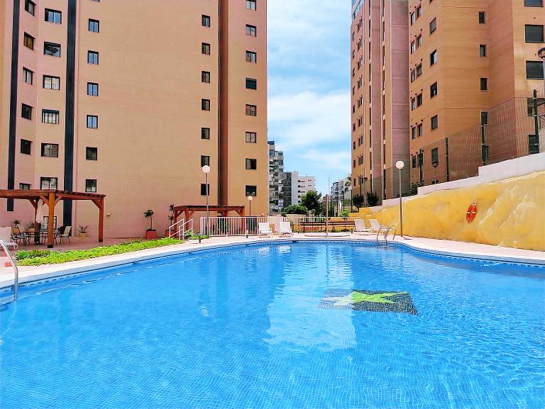 Holiday apartment with pool, yard & terrace in Benidorm