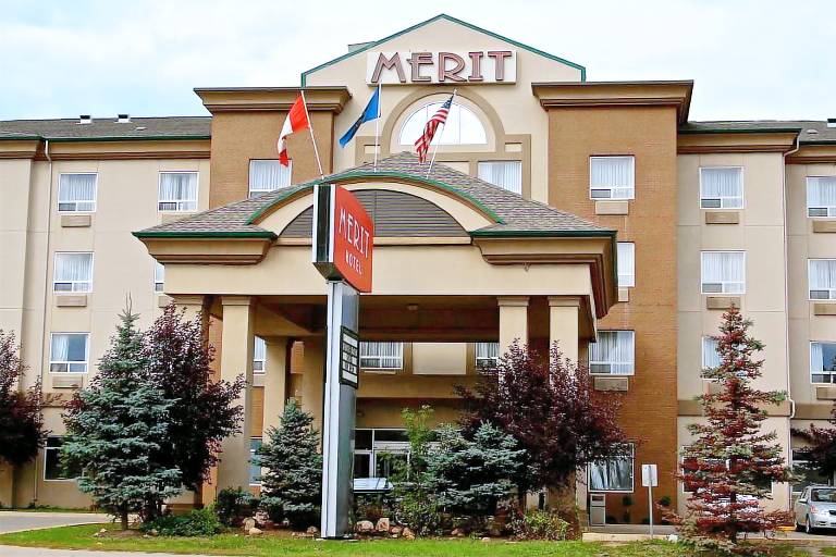 Merit Hotel & Suites