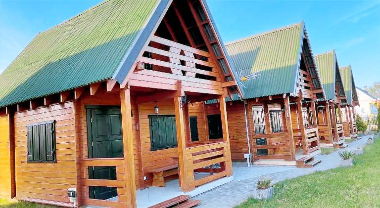 Lodge with garden, patio & grill in Darlowo