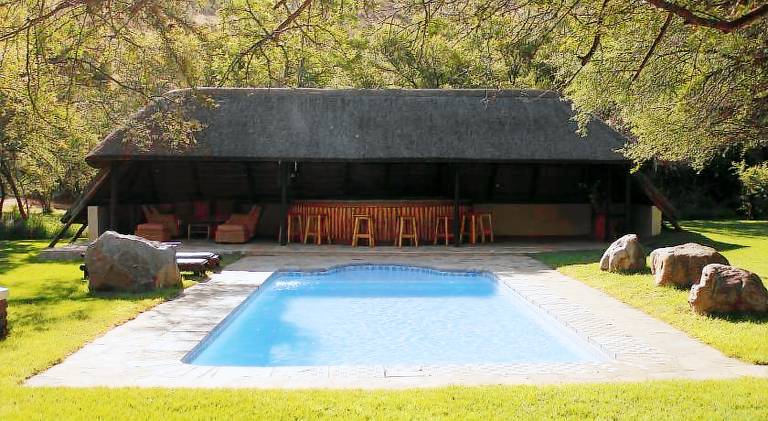 Lodge with patio, pool & garden — photo 2