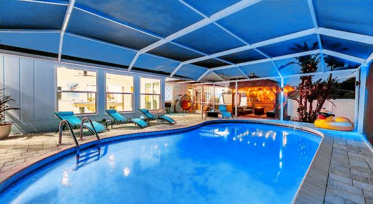 NEW! Blue Iguana! Tropical backyard oasis with heated pool, hot tub, fire table, and more! — photo 4