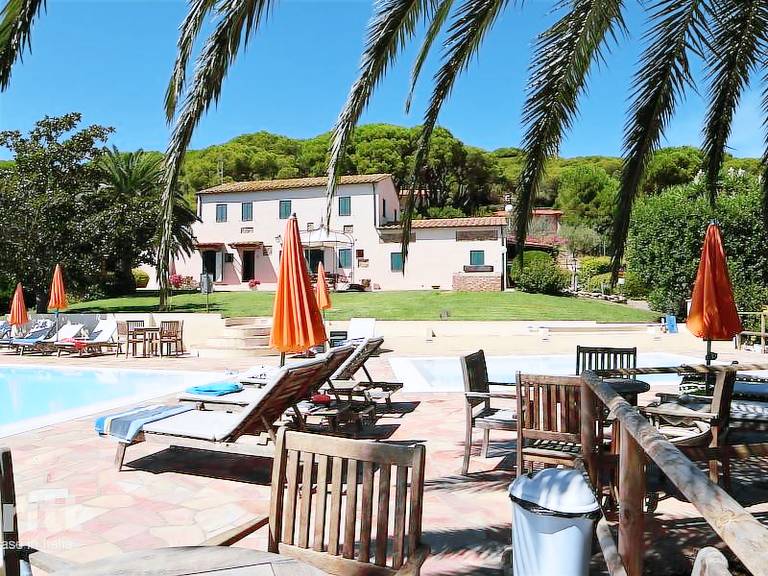 Vacation home with BBQ, terrace & yard in Porto Azzurro