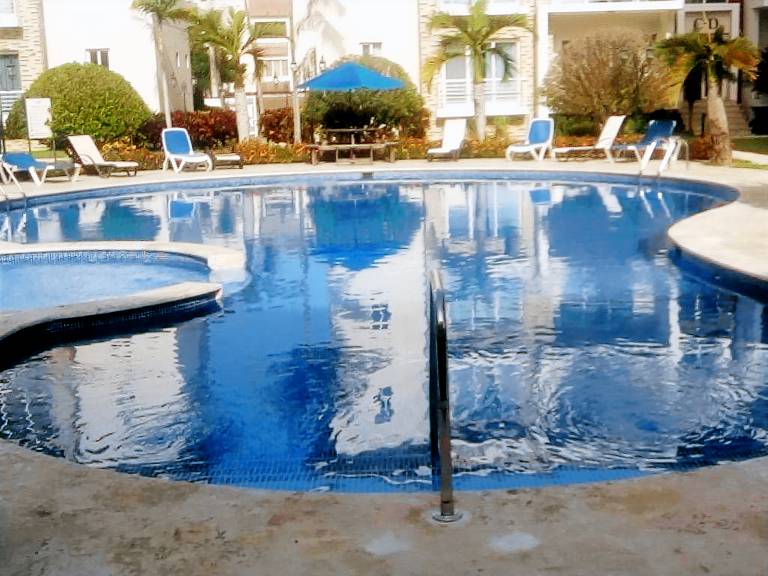 Apartment with patio, yard & pool — photo 4