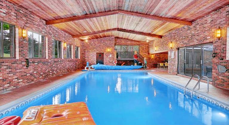 Vacation home with pool & hot tub | Dogs allowed in Gaylord, MI