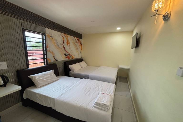 Sunway Karnival Deluxe Triple Room