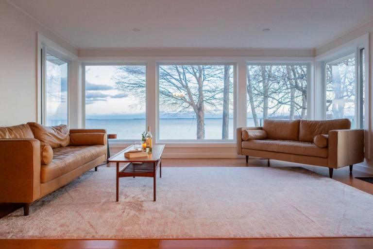 Lakefront Cottage with Private Dock and Luminous Minimalist Interior in Tennessee in Prince Edward, ON