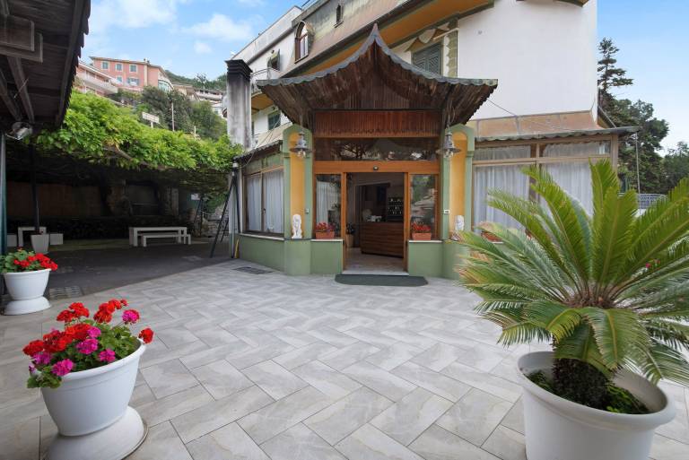 Holiday apartment with pool, terrace & yard | Garden view — photo 2