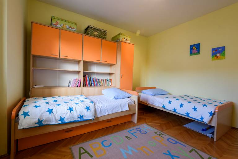 The apartments consists of two bedrooms, a bathroom, a kitchen and a living room — photo 3