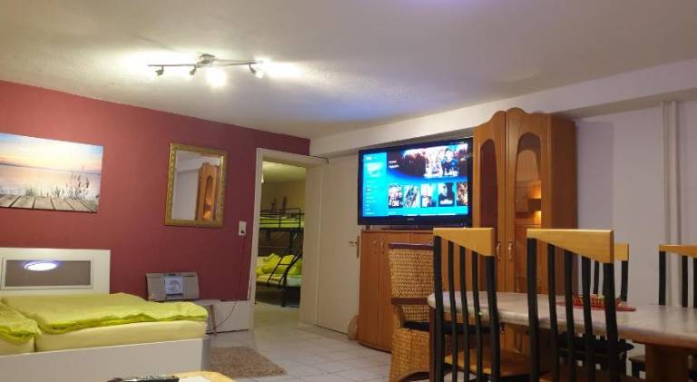 Holiday apartment with yard & patio — photo 2