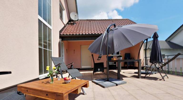 Holiday apartment with yard, terrace & sauna — photo 2