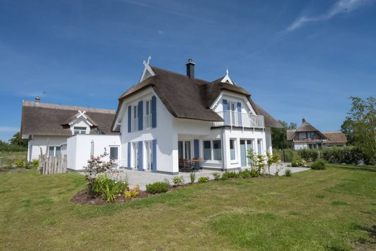 Ferienhaus Amrai – Reetgedeckter Urlaubstraum im Hafendorf Puddemin — photo 2