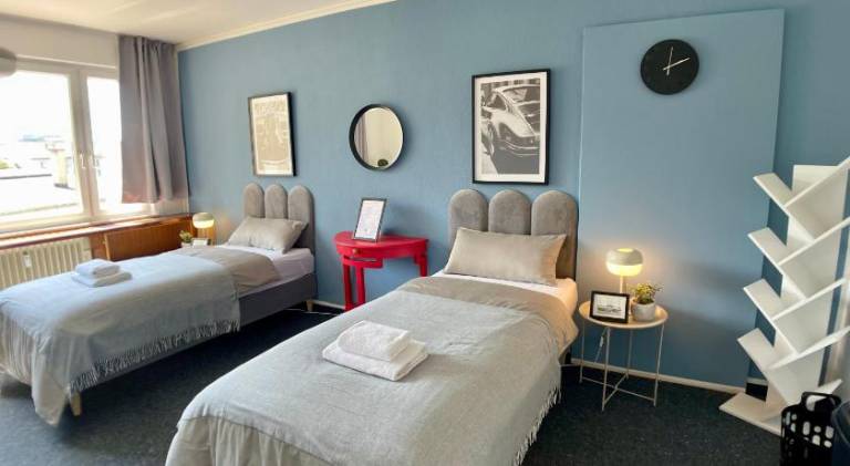 Urban Haven-Zentrum-3 Schlafzimmer-5 Einzelbetten-Waschmaschine in Stuttgart