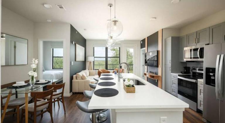 Stylish Downtown 2BR Retreat with Parking and Pool — photo 3
