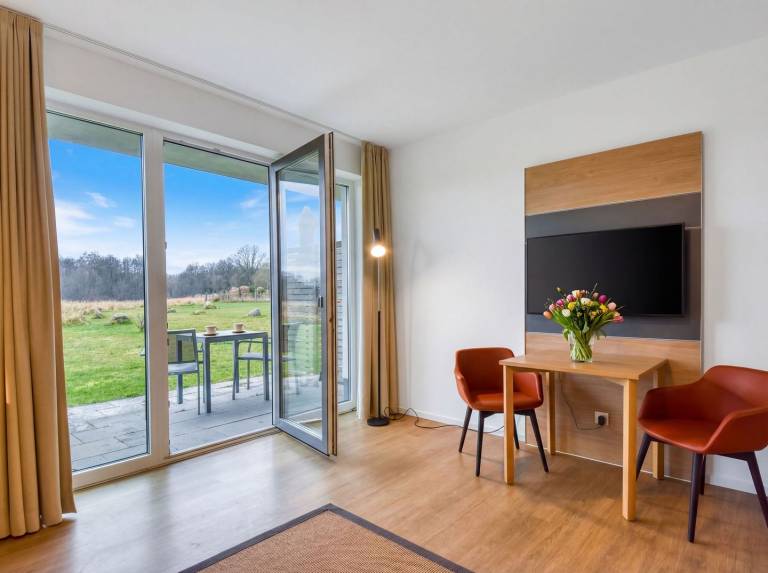 Ferienwohnung Graureiher 18 im Wreecher Idyll Rügen mit Terrasse und Garten — photo 3