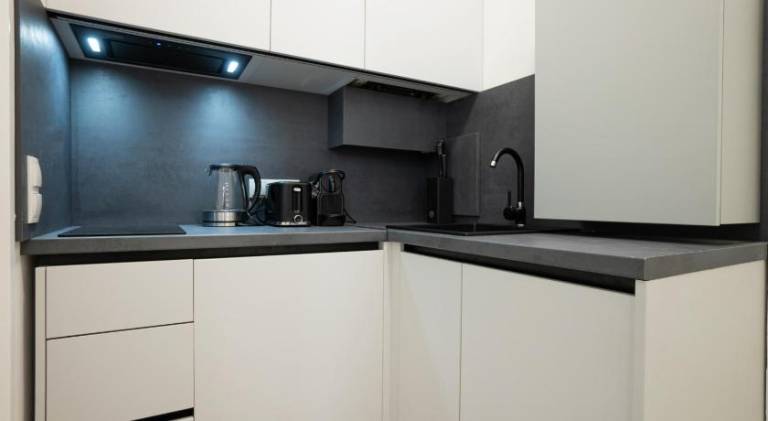 Bright & Airy Apartment with Balcony near City Center — photo 3