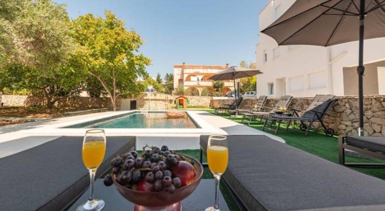 Villa with pool — photo 2