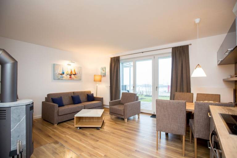 Gemütliches 2-Zimmerapartment mit Kaminofen, Terrasse im Haus 7 Nr 81 — photo 2