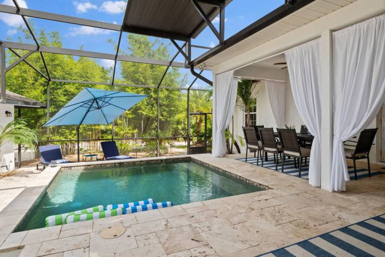 Beach Cottage 3 Bed 2 Bath Heated Pool Free Golf Cart bring your Boat RV Private 1AC lot in Palm Coast, FL
