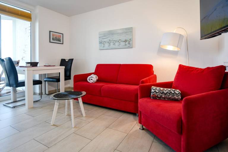 HZ05 – Nordsee-Ferienwohnung mit Seeblick und Balkon an der Promenade — photo 2