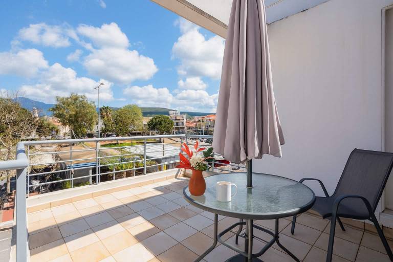 Studio with Balcony Steps from Filiatra Square