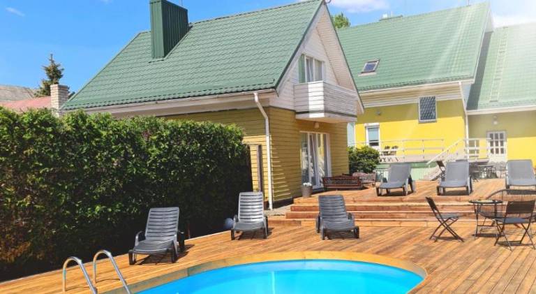 SAULES SVECIU NAMAI in Palanga