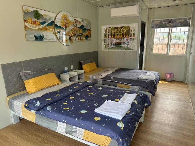 Golden sunrise guesthouse 金旸宾馆 in Vang