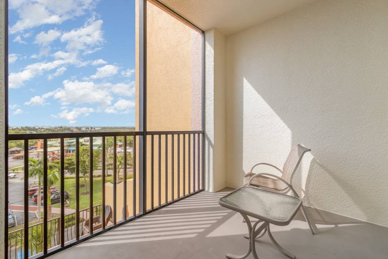 Condo with barbeque & heated pool | Water view — photo 5