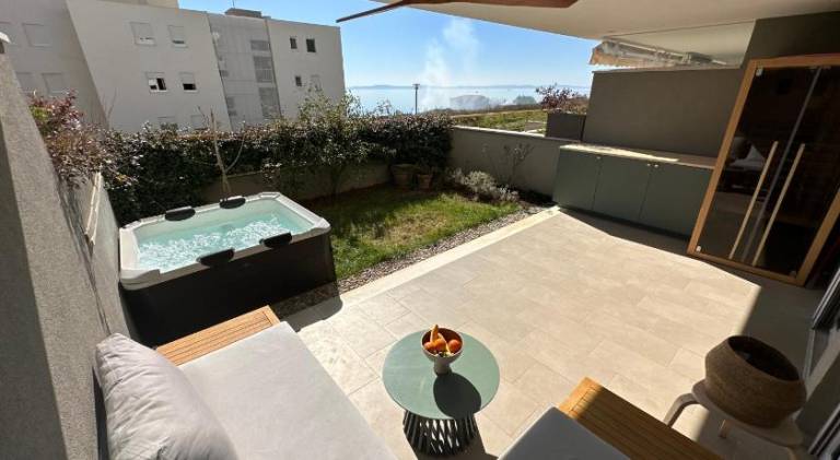 Znjan beachfront luxury beautiful new apartment with garden jacuzzi and sauna in Split