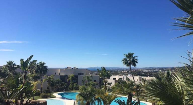Holiday apartment with yard, terrace & private pool in Benahavis