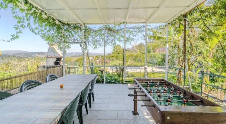 Vacation home with terrace, grill & yard — photo 4