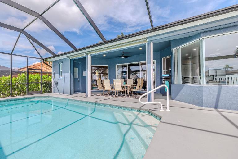 Family-oriented villa with private pool, garden & grill | Water view | Pet-friendly — photo 3