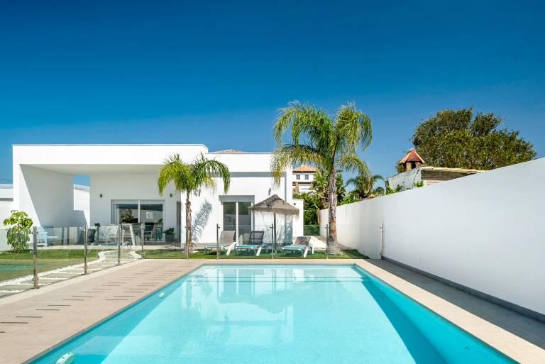 Family-oriented charming vacation home with terrace, garden & private pool | Garden view | Suitable for remote work | Dogs allowed in Conil de la Frontera