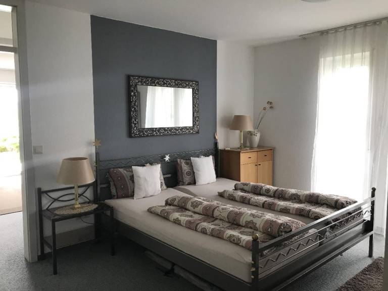Child-friendly rental apartment with garden, pool & BBQ | Garden view | Dogs allowed — photo 3