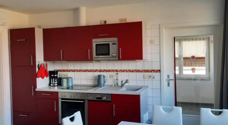 Apartment with barbecue, garden & patio — photo 2