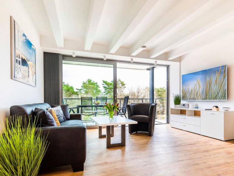 FeWo Dünenheide 3.4: Familienfreundliche Maisonette-FeWo 90 m² mit Meerblick — photo 4