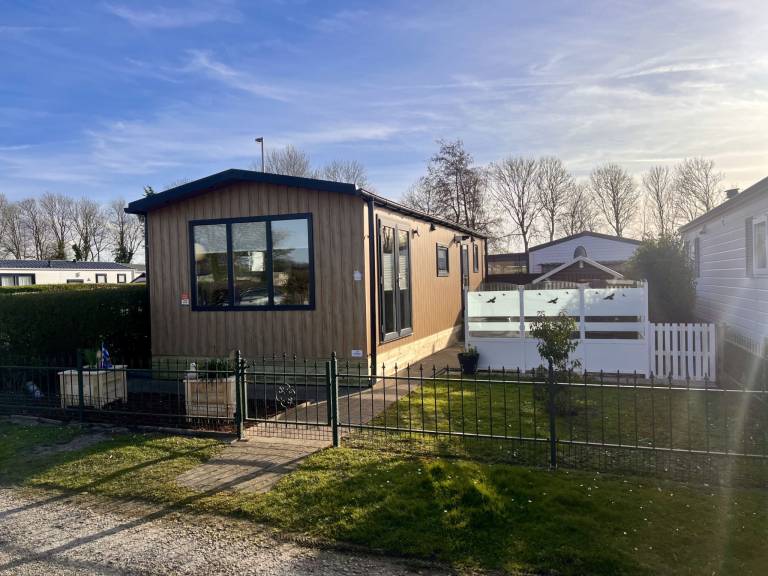 Vacation home with yard, patio & pool in Kamperland