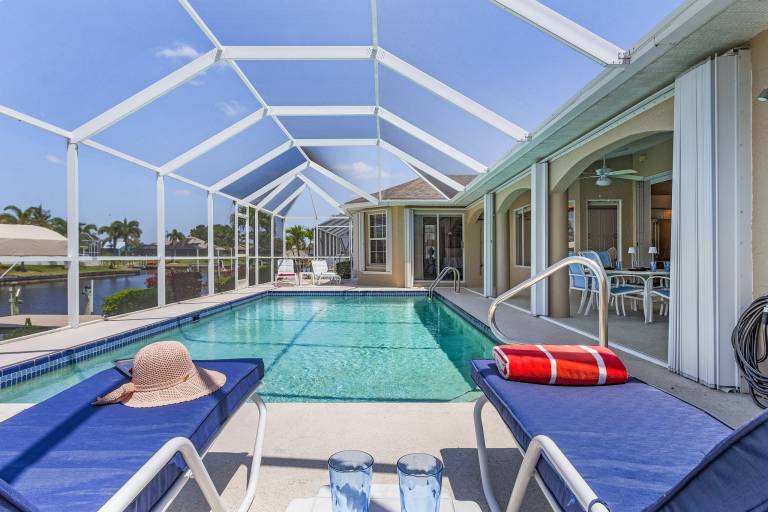 Vacation home with BBQ & private pool | Water view in Cape Coral, FL