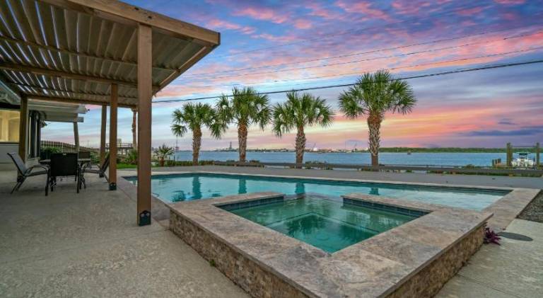 Relax in Style – 5BR Home w Pool Hot Tub Stunning Harbor Views in Galveston, TX