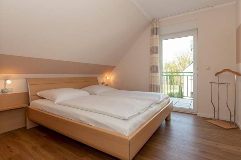 Ruhige, hübsche Ferienwohnung in Strandnähe mit Balkon am idyllischen Stadtwald — photo 4